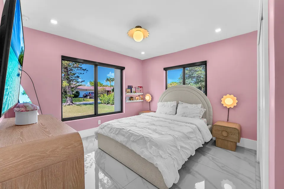Bedroom with large windows